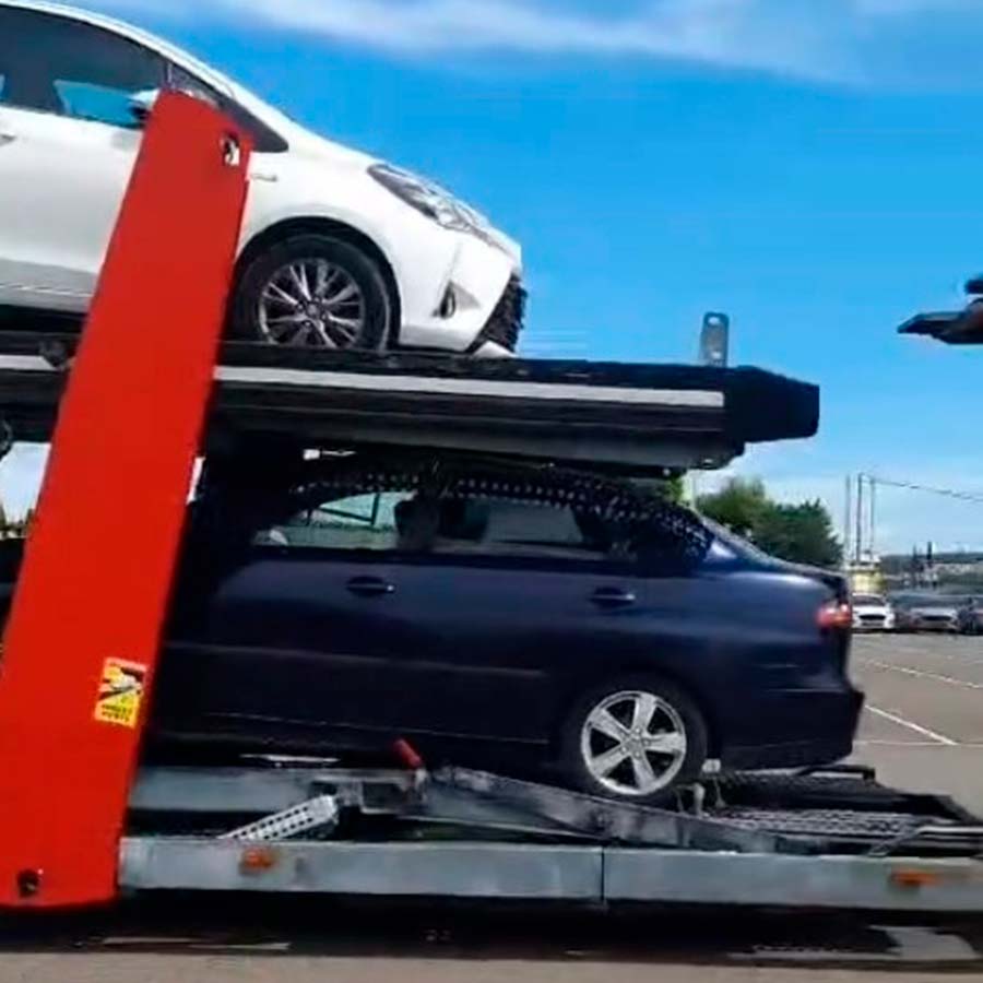 Autotransportes Sierra López vehículos sobre camión portacoches